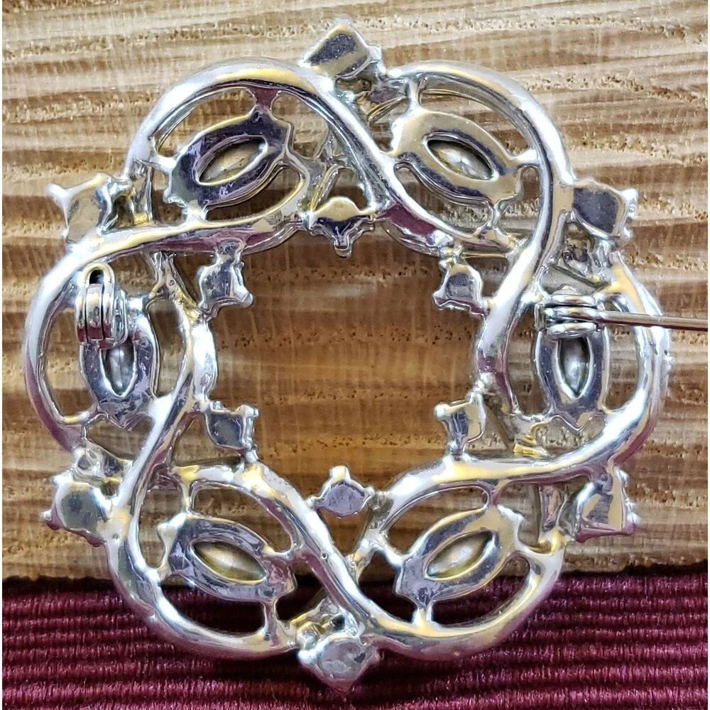 Vintage Unsigned Round Metal Brooch/Pin, Silver Tone Ribbon, Blue Rhinestones